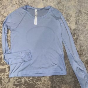 Lululemon blue swiftly tech size 8. Never worn